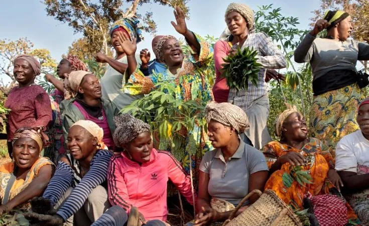 Women gathered outdoors in a community setting